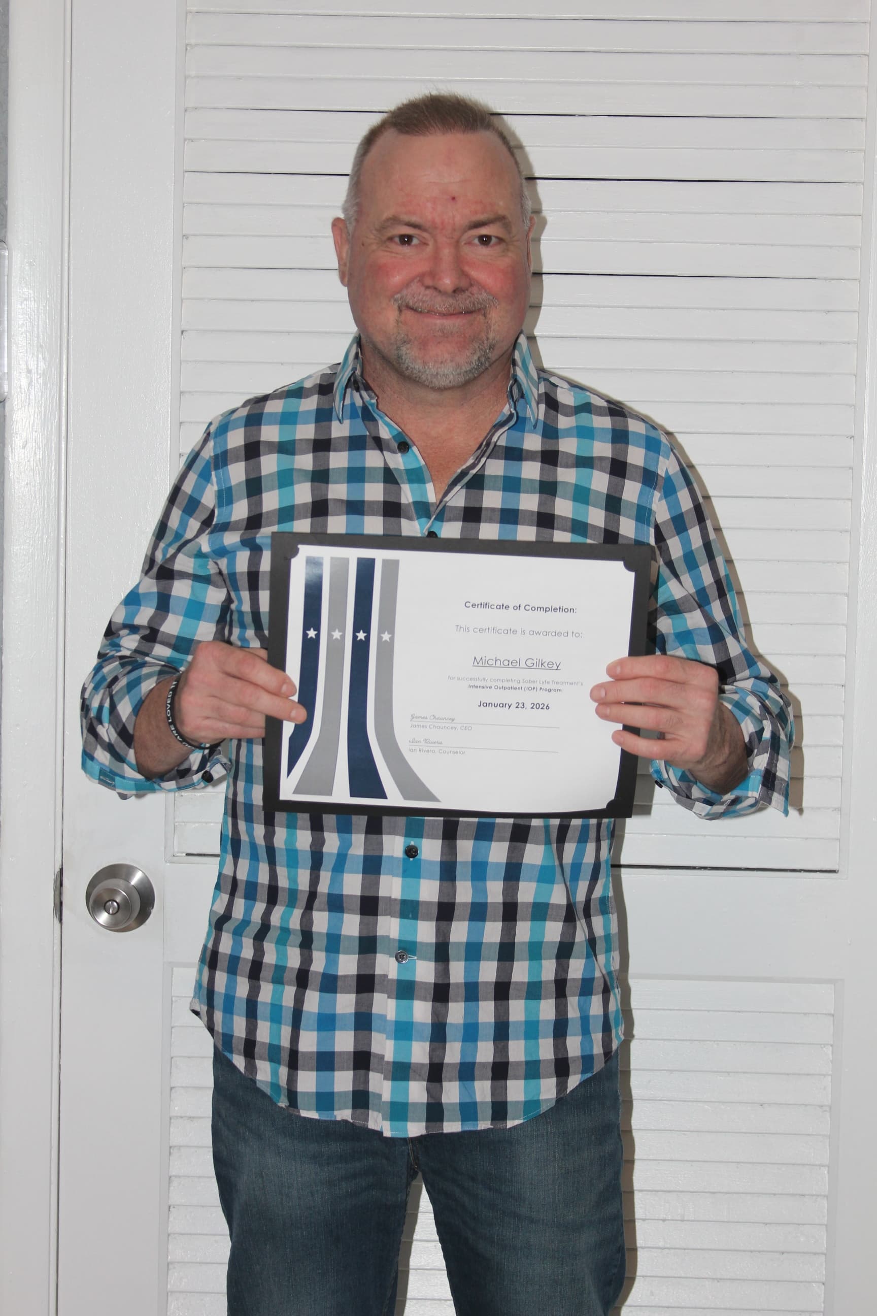 Michael G. — Sober Lyfe Treatment graduate, holding a Certificate of Completion
