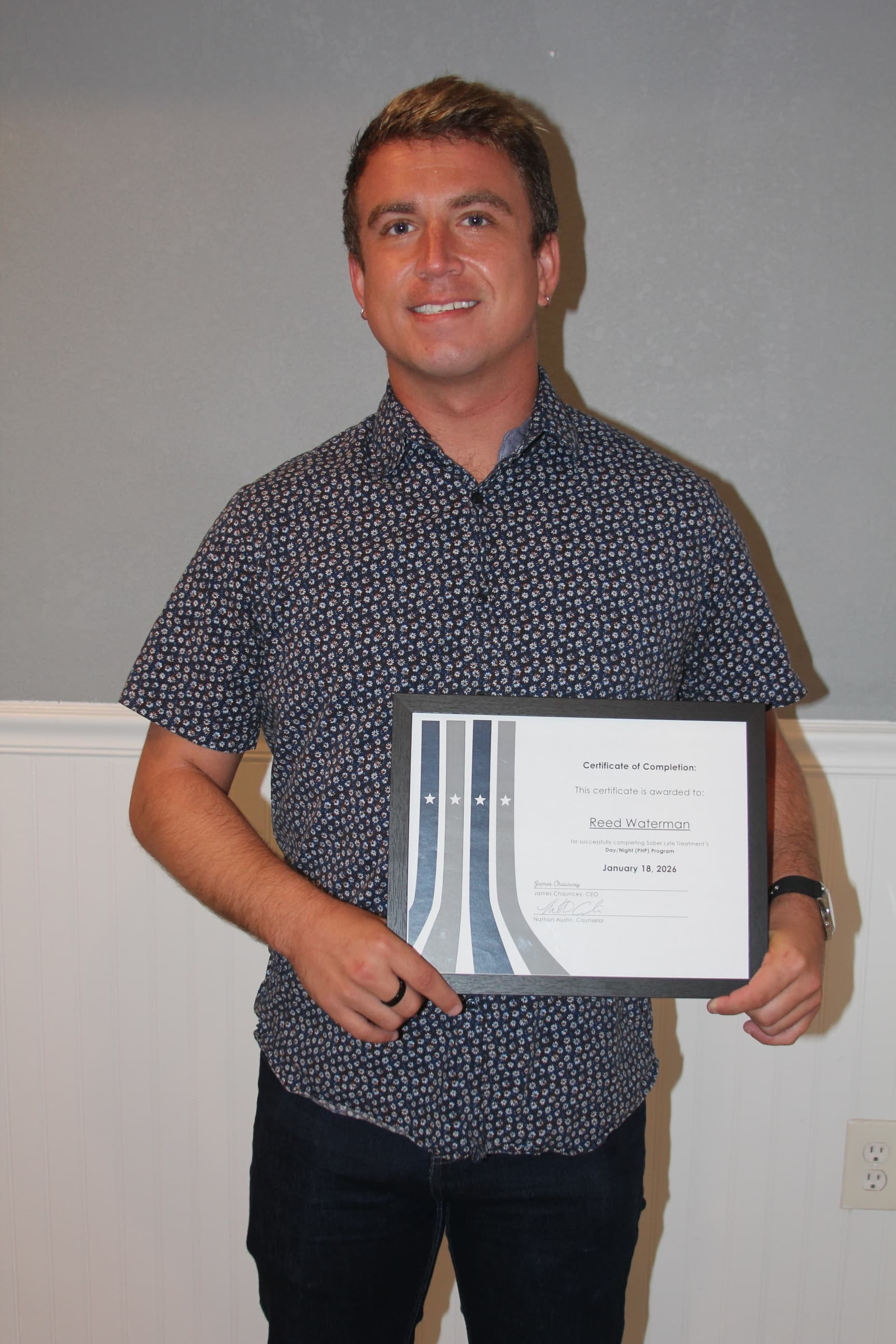 Reed W. — Sober Lyfe Treatment graduate, holding a Certificate of Completion