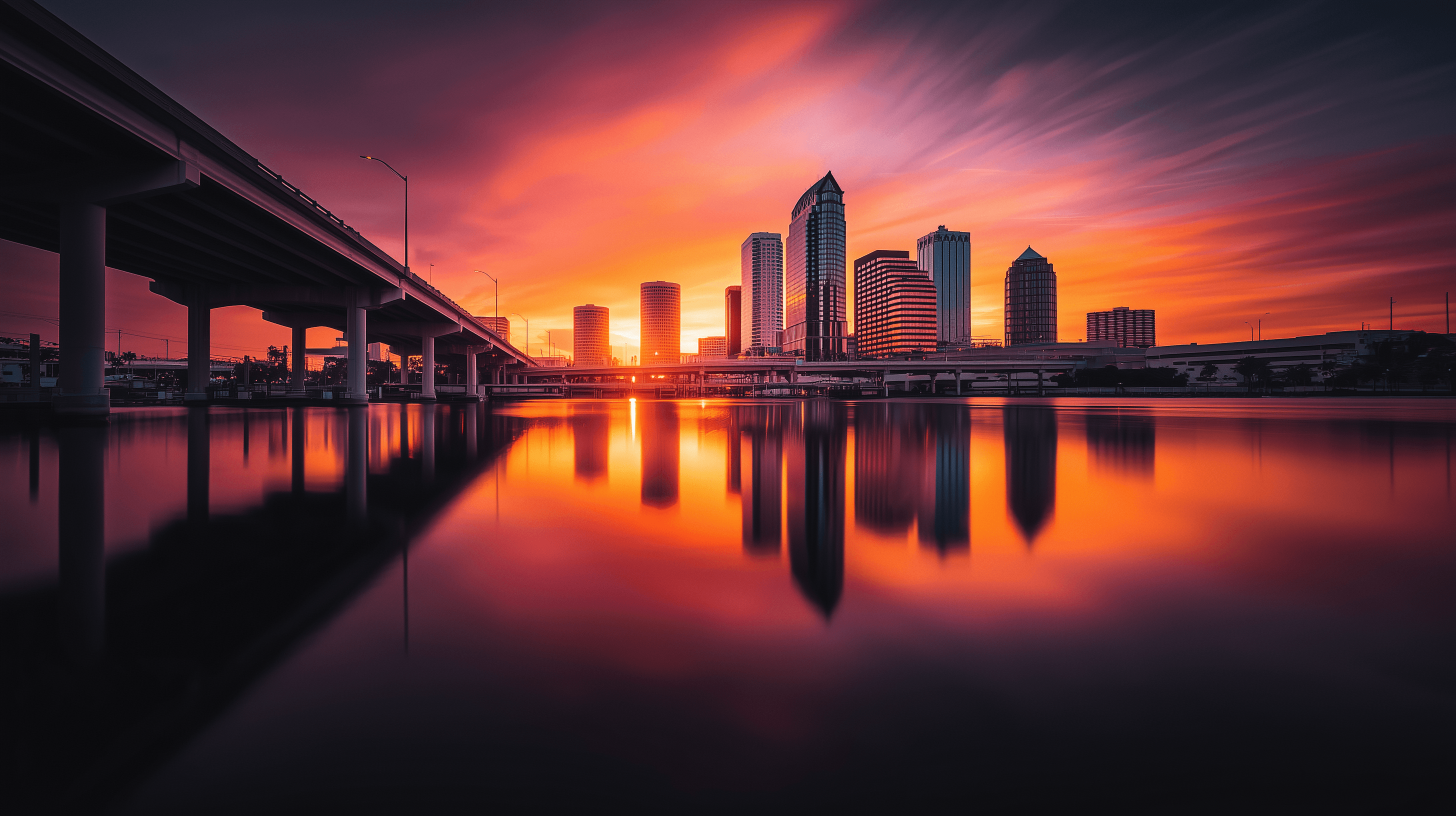 Tampa skyline at sunset over the water